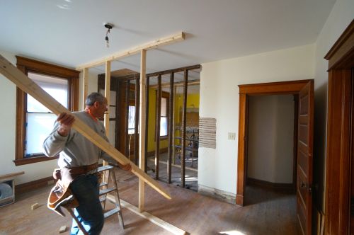 My brother, Robbert, helped install the structural beams. Before removing the old studs, we had to support the existing load bearing floor joists. 