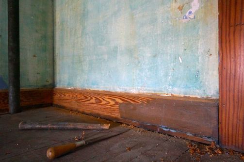 I got lucky with third floor baseboard. It was relatively easy to carefully scrape the paint off then sand and shellac.