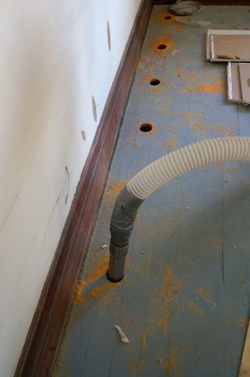 I made wood plugs from old flooring to patch the holes.